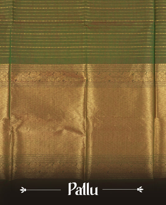 Green and magenta colour dual shaded Chettinad cotton saree adorned with delicate golden zari lines on the body, The rich magenta border features intricate floral and paisley zari motifs & Comes with a matching blouse piece.