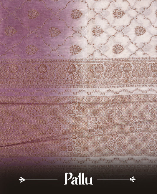 Cream colour semi tussar Banarasi saree featuring Antique zari motifs on body, paired by contrast onion pink colour border, and a matching blouse piece.