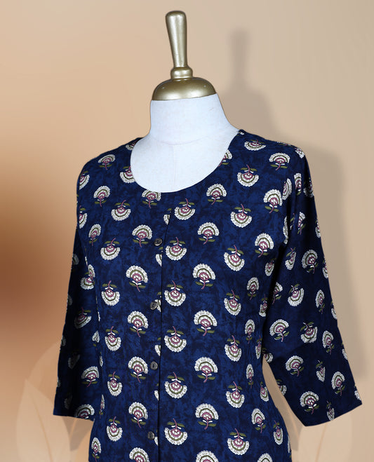Navy blue colour kurti featuring a round neckline with button detailing, 3/4th sleeves, and an all over floral print in pink,green and beige, designed in a straight cut silhouette for a simple and elegant everyday look.