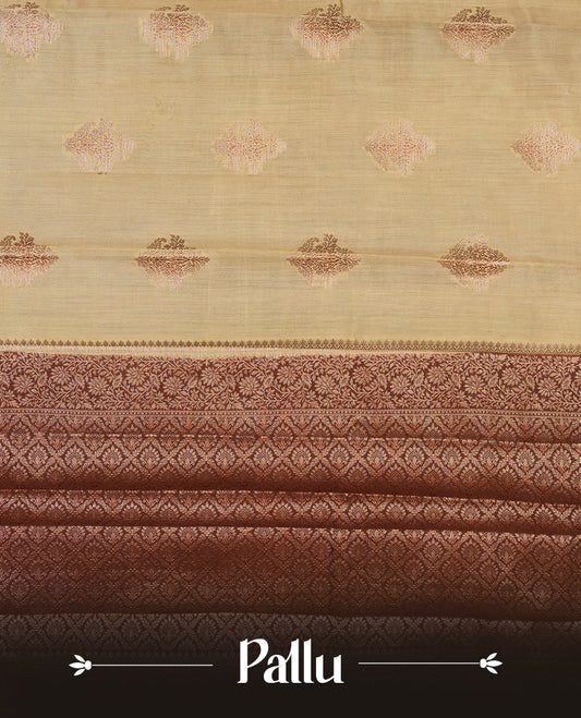 Cream beige Banaras soft silk saree with gold zari motifs on body, with contrast Chocolate brown colour floral pattern on pallu, border, and Matching blouse.