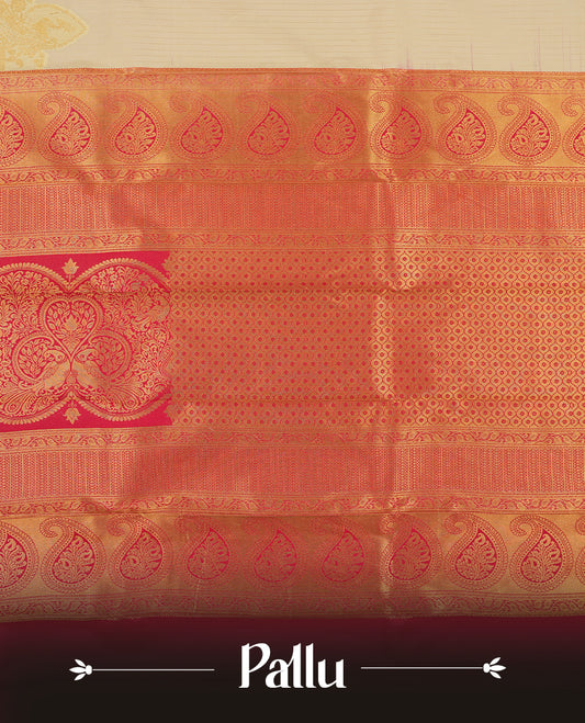 Ivory Semi Silk Saree with gold zari striped body and peacock motifs, complemented by a contrasting rani pink pallu and border in gold zari with traditional motifs, paired with a matching blouse piece