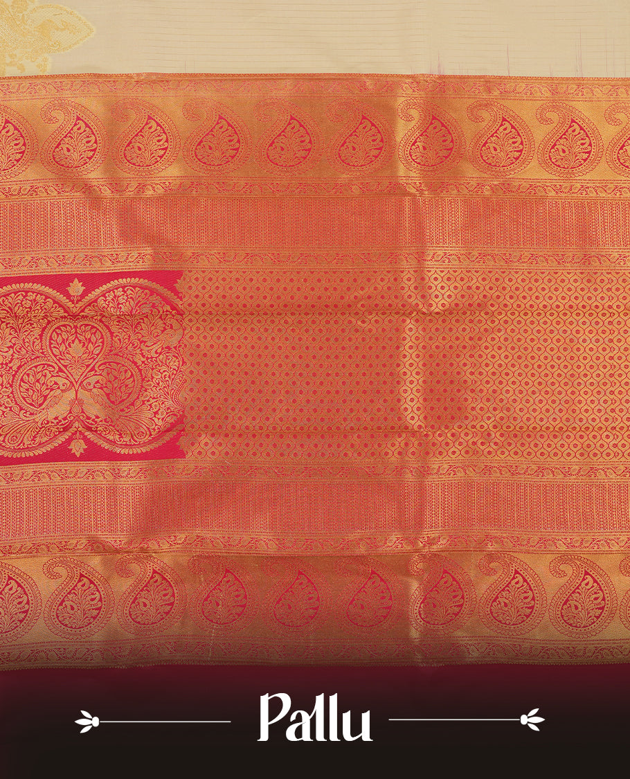 Ivory Semi Silk Saree with gold zari striped body and peacock motifs, complemented by a contrasting rani pink pallu and border in gold zari with traditional motifs, paired with a matching blouse piece