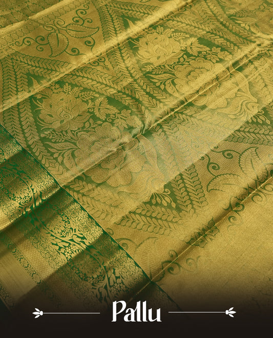 Antique golden Zari Tissue Brocade Saree features intricate a red colour flower Motifs on body and a green colour border & pallu with traditional patterns, paired with matching blouse