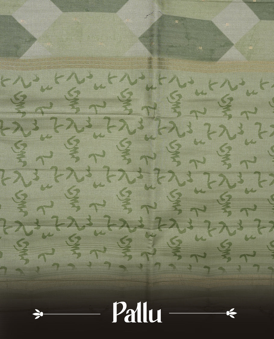 Green colour semi tusser silk saree featuring geometric print pattern across body, gold zari border with style motifs and paired with matching blouse.