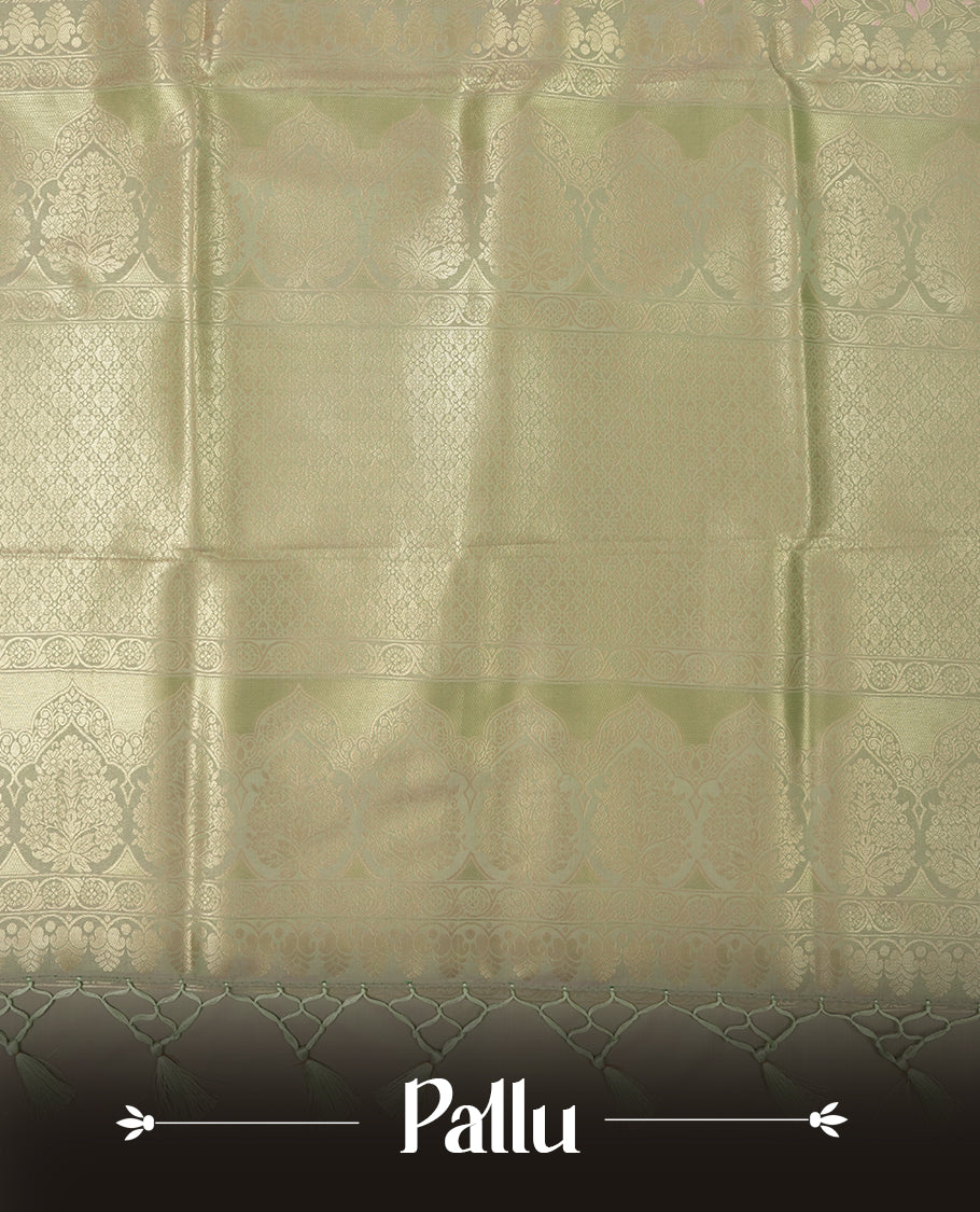 Pastel green colour semi soft silk saree featuring an all-over woven leaf pattern in gold colour, finished with a matching border adorned with detailed paisley and floral motifs, and a matching blouse piece.