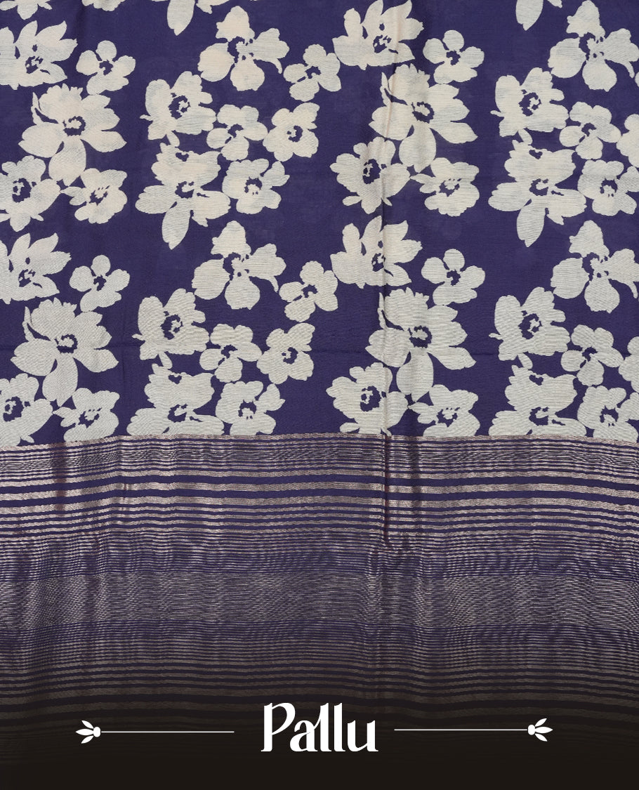 Navy blue colour Viscos semi printed saree featuring a light golden zari border, abstract Off white printed motifs on the body, and comes with a matching blouse