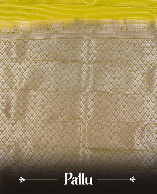 Lemon green Colour Semi Silk Saree with gold zari stripes on the body, paired with a contrasting olive colour pallu and border, and a matching blouse piece.