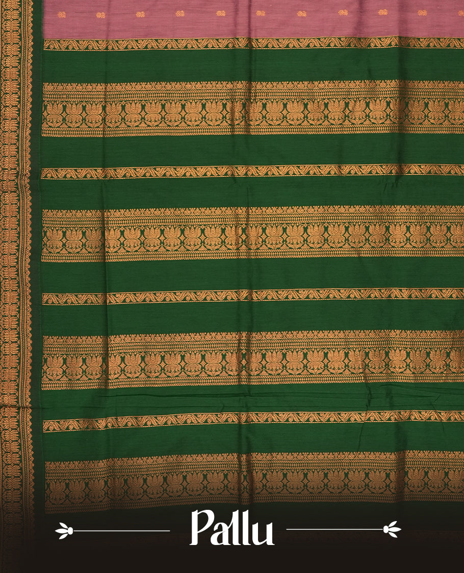 Lavender colour Kalyani Cotton saree with deep green border and pallu, adorned with copper zari lotus motifs and intricate weaving & Comes with a matching blouse piece.