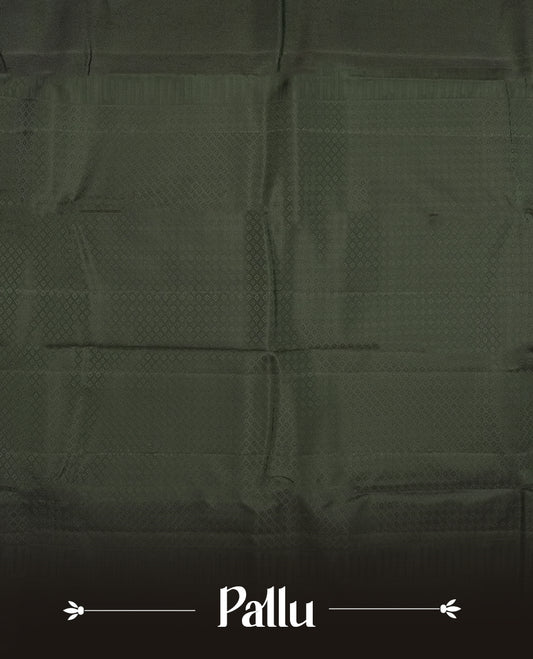 A dark green colour semi soft silk saree featuring a self coloured woven border and patterned body, complemented by self coloured pallu and a matching blouse piece.