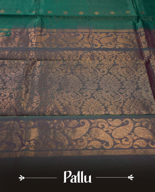 Teal colour pure handloom cotton saree featuring fine golden stripes with delicate motifs, paired with a rich zari purple double shaded border for a traditional yet elegant look, perfect for graceful occasions & Comes with matching blouse.
