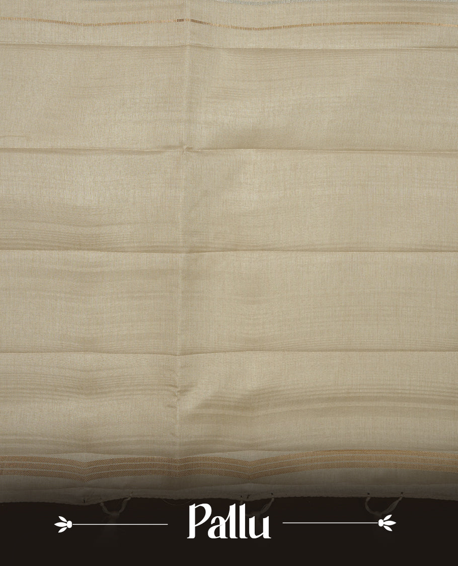 Beige colour semi tussar silk saree highlights gold and silver zari stripes across body,  border, pallu and paired with matching blouse piece.