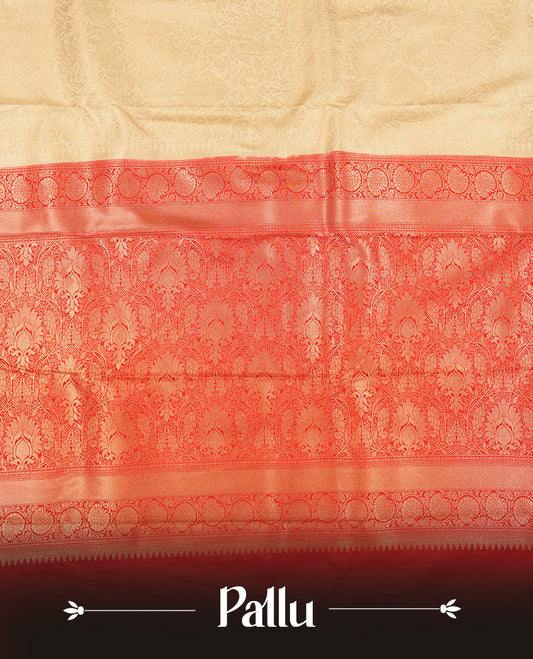 Cream colour semi silk brocade saree featuring intricate Gold floral kodi patterns across the body, complemented by a Contrast rich red colour woven border and pallu, paired with a matching blouse.