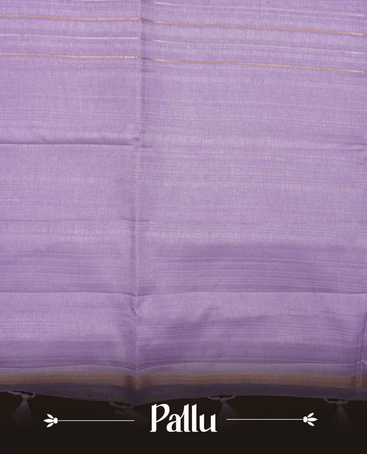 Pastel lavender colour chettinad saree highlights gold and silver zari stripes across body,  border, pallu and paired with matching blouse piece.