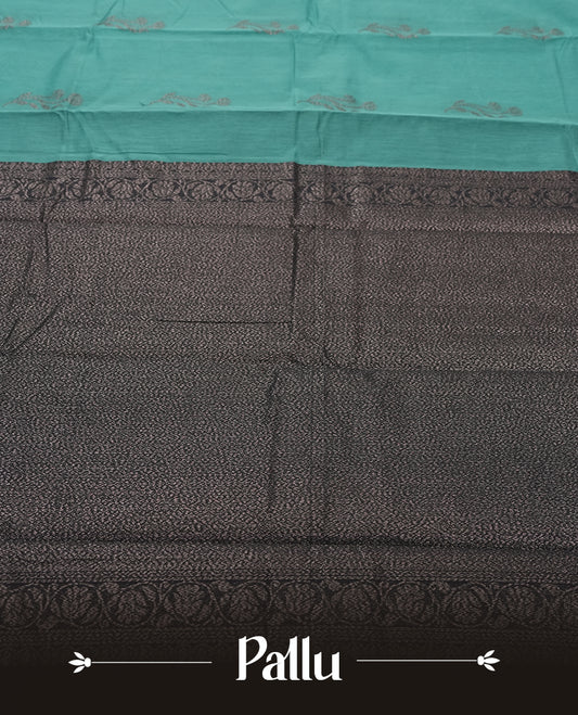Teal Colour Silk Cotton Saree with Silver Floral Butta Body, Contrasting Silver Zari Pallu & Border, Floral Vine Motifs, and Matching Plain Woven Blouse Piece