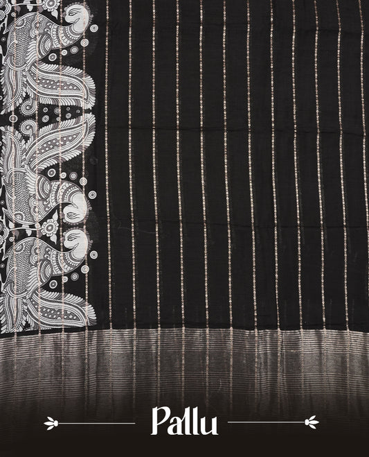 Black colour chanderi silk saree with gold zari strip pattern On body, compilmented by self colour border with antique zari pattern & white peacock print pattern and a matching blouse.