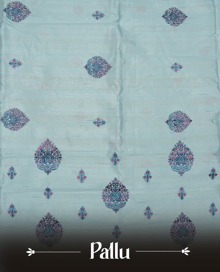 Light blue colour semi tusser silk saree featuring Floral thread embroidery across body, without border and paired with matching blouse.