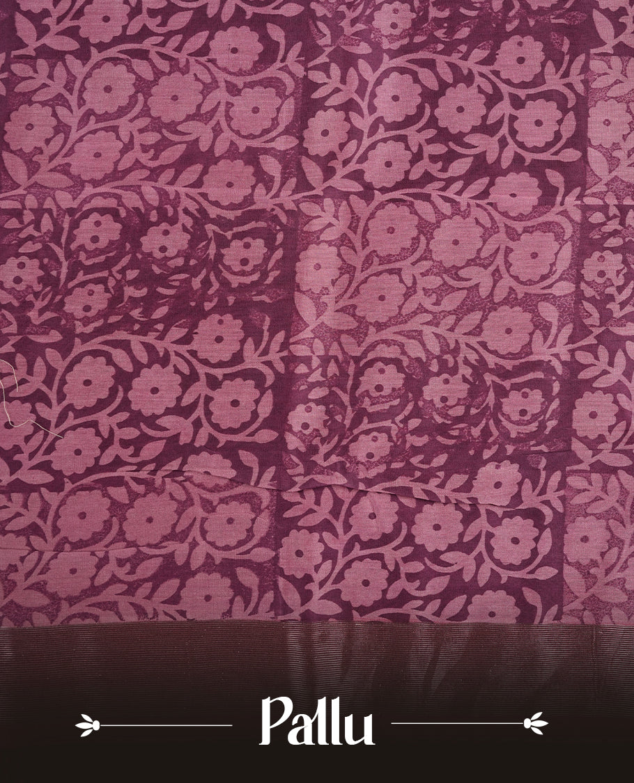 Purple colour chanderi silk saree featuring floral kodi print pattern across body, with contrast red colour border with zari pattern and paired with matching blouse.