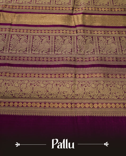Deep Magenta colour pure Kanchi cotton saree featuring with delicate golden checks on body, paired with a contrasting beige zari woven border & Includes a matching blouse piece for a complete look.