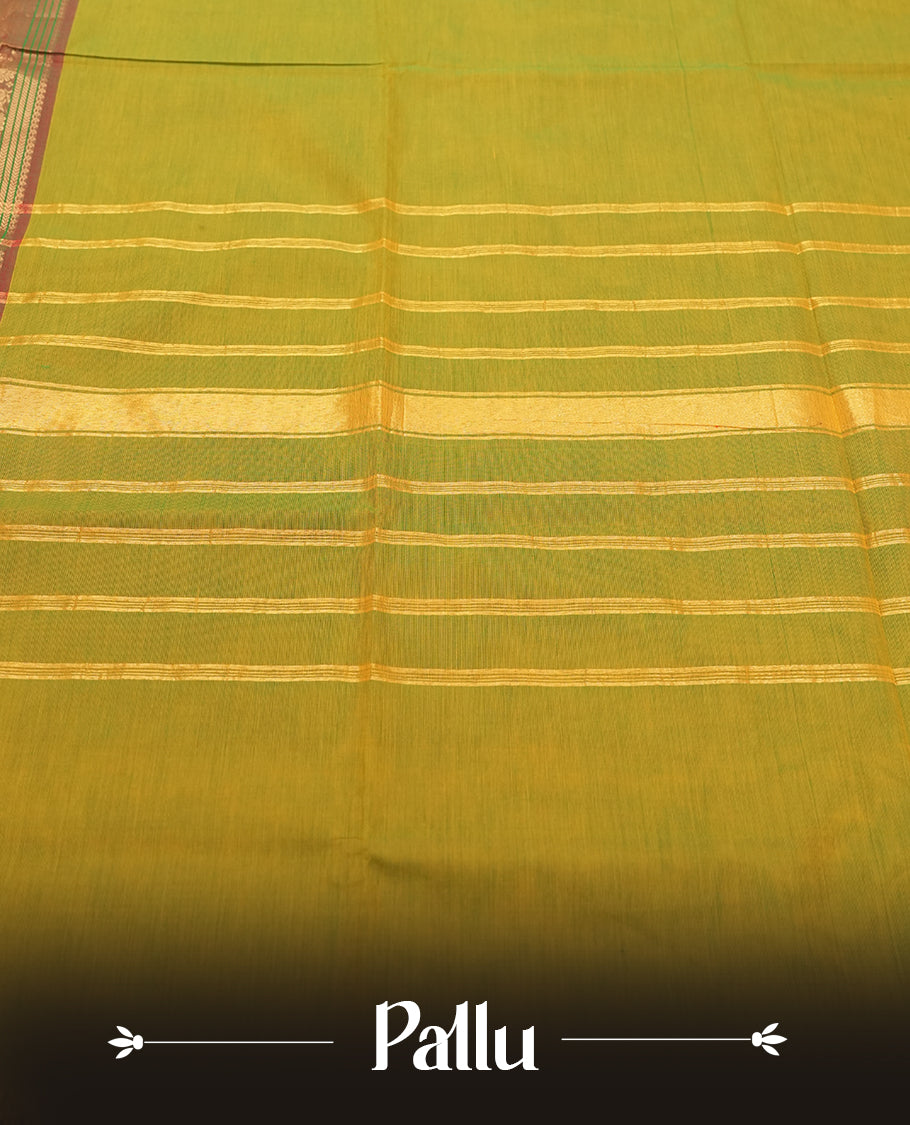 Olive Yellow Colour silk cotton saree with rich temple-red zari border featuring peacocks and elephant motifs, subtle gold-striped pallu, and a coordinated Olive Yellow blouse with matching zari border.