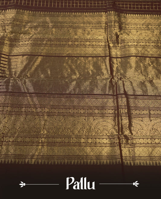 Dark Coffee Brown colour pure Kanchi cotton saree featuring with delicate golden checks on body, paired with a contrasting green zari woven border & Includes a matching blouse piece for a complete look.