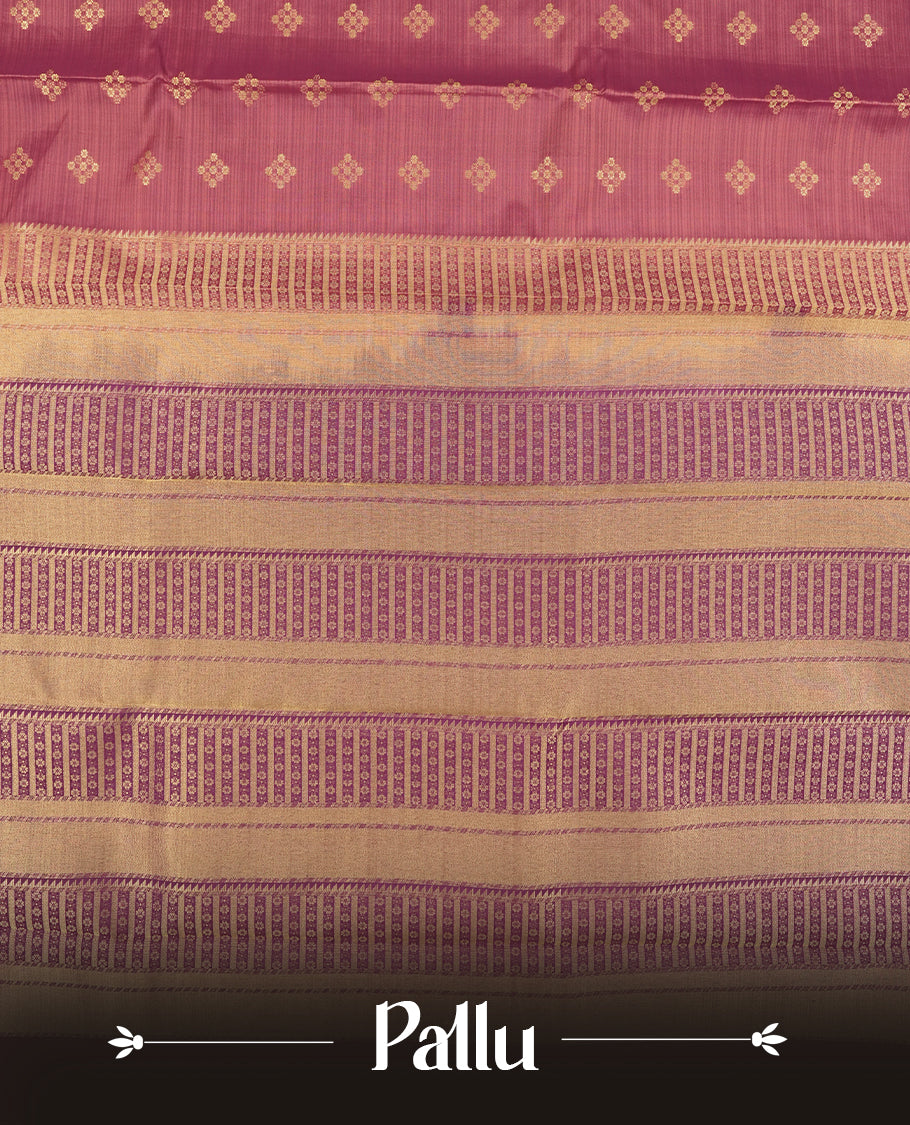 Twilight lavender colour semi soft silk saree featuring a golden textured patterned body, complemented by contrast purple with golden motifes on pallu & border and a matching blouse piece.