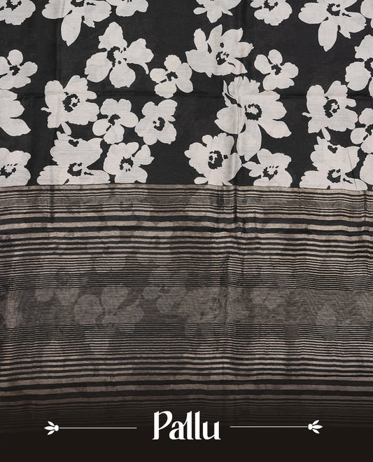 Black colour Viscos semi printed saree featuring a light golden zari border, abstract off white printed motifs on the body, and comes with a matching blouse