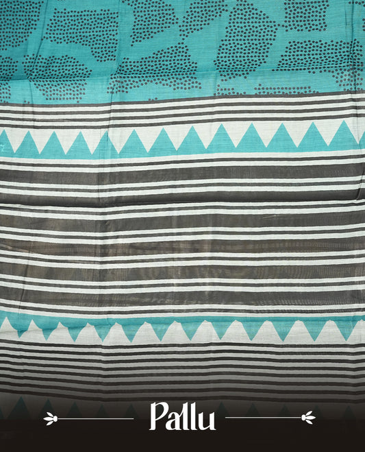 Dark teal colour mixed chanderi cotton saree with black dot motifs, multicolor striped pallu with black, off-white and turquoise triangle geometric pattern, golden zari border, and matching blouse.
