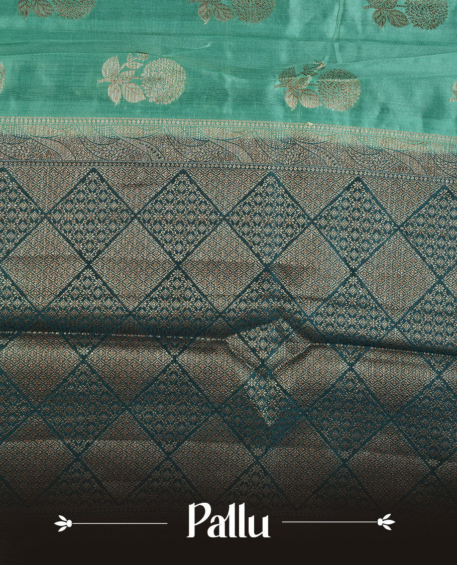 Aqua Green colour Pure tussar Banarasi saree featuring Gold zari motifs on body, a contrast Teal colour gold zari border, and blouse piece.