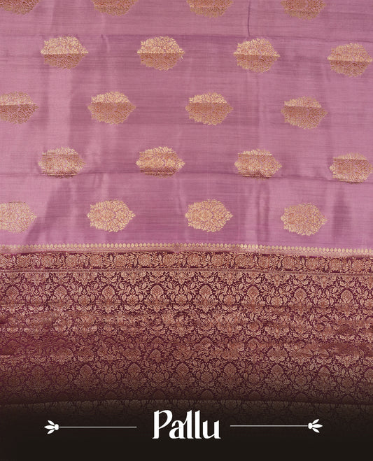 Pastel Pink Colour Banaras Soft Silk Saree with Gold Zari Textured Oval Buttas, Simple Decorative Pallu Border, Grand Pallu with Ornate Floral and Foliate Motifs in Deep Maroon and Gold Tones, and Matching Deep Maroon Blouse.