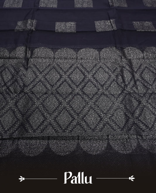 Black Silk Cotton Saree with Silver Rectangular/Square Butta Body, Featuring Silver Zari Chevron Patterned Border on Grand Pallu, Paired with Matching Gray/Silver Plain Blouse Piece