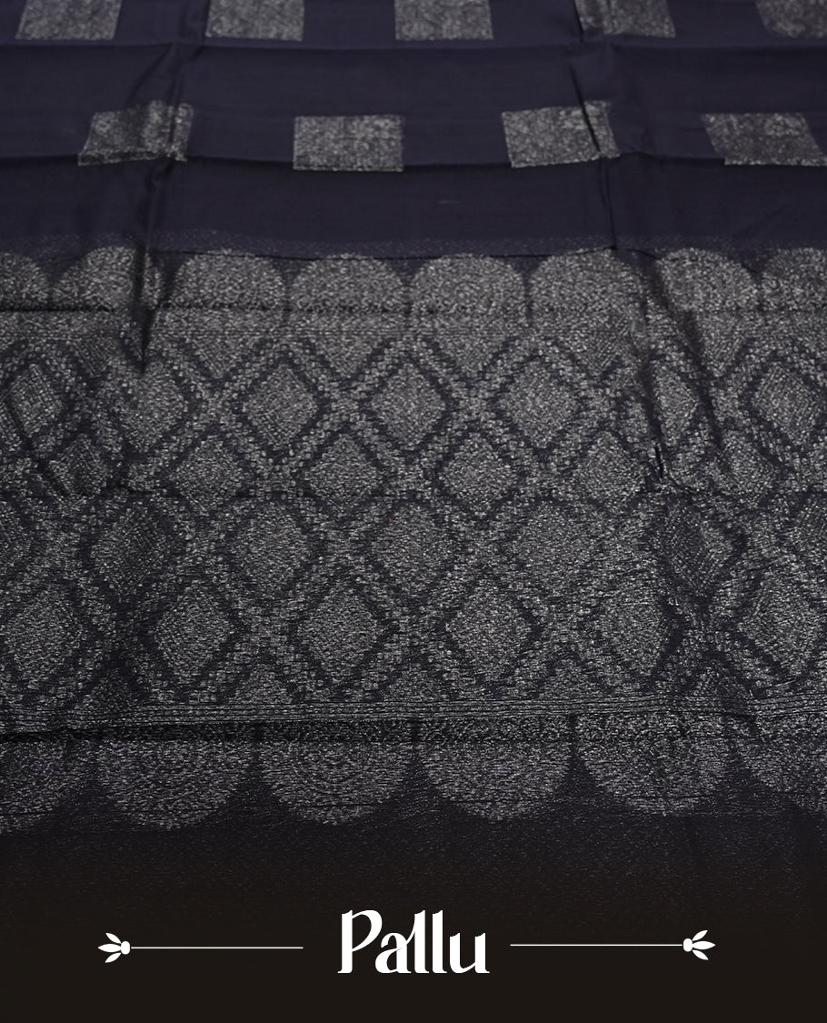 Black Silk Cotton Saree with Silver Rectangular/Square Butta Body, Featuring Silver Zari Chevron Patterned Border on Grand Pallu, Paired with Matching Gray/Silver Plain Blouse Piece