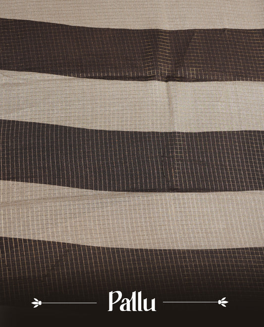 Deep Brown colour saree featuring fine check patterns on the body, paired with a contrast zari woven border and pallu. Comes with a matching blouse piece