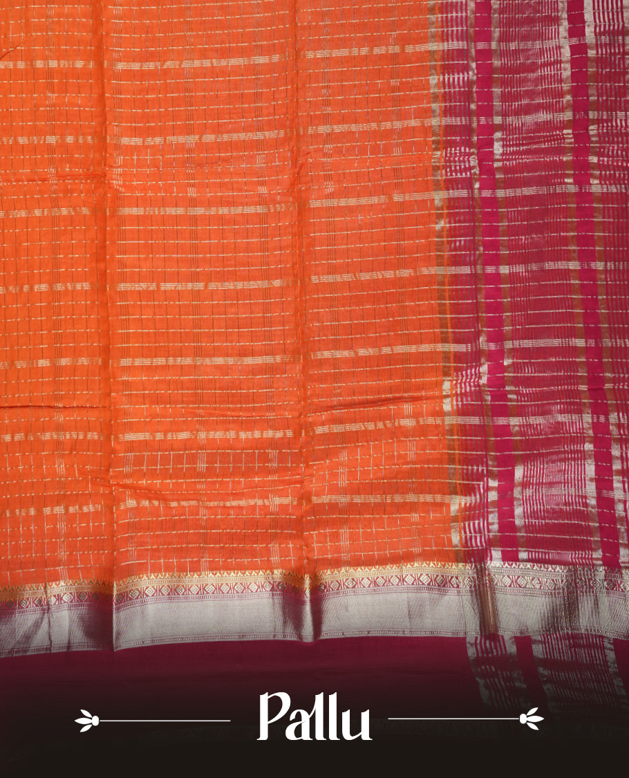Coral orange colour mixed chanderi cotton saree with zari checkered body, rosegold zari border, magenta-pink pallu with zari checks, and matching magenta blouse.