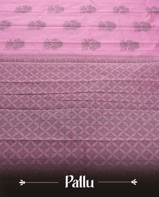 Pastel purple colour silk cotton saree featuring elegant floral zari motifs on the body, complemented by a rich contrast dark border and pallu with traditional woven detailing & Comes with a matching blouse piece.