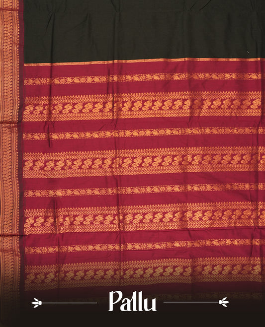 Black colour Kalyani Cotton saree in deep maroon with golden motifs, paired with a contrasting maroon border featuring intricate zari work & Comes with a matching blouse piece,