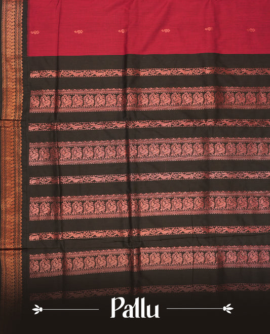 Maroon colour Kalyani cotton saree with subtle zari motifs all over, paired with a contrasting black rich copper zari woven border and pallu & Comes with a matching blouse piece.