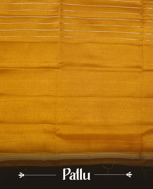Mustard colour chettinad saree highlights gold and silver zari stripes across body,  border, pallu and paired with matching blouse piece.