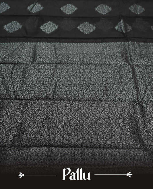 Black Cotton Saree with Silver Zari Textured Circular/Medallion Butta Body, Featuring Elaborate Zari-Woven Pallu with Multi-Layered Ornamental Border Patterns and Fine Geometric Details, Paired with Matching Gray Woven Textured Plain Blouse Piece