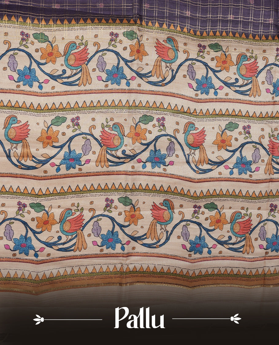 Violet colour semi tusser silk saree featuring gold zari check pattern with floral butti motifs, with contrast floral kodi & bird pattern and paired with matching blouse.