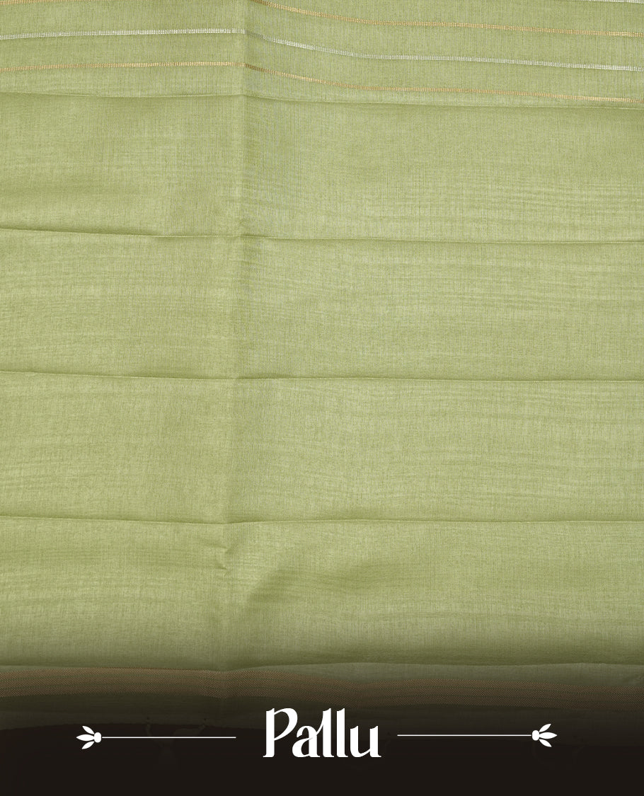 Pastel green colour semi tussar silk saree highlights gold and silver zari stripes across body,  border, pallu and paired with matching blouse piece.