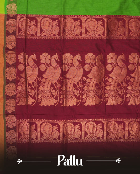 Parrot green colour Kalyani Cotton saree in deep maroon with golden peacock motifs, paired with a contrasting maroon border featuring intricate peacock zari work & Comes with a matching blouse piece.