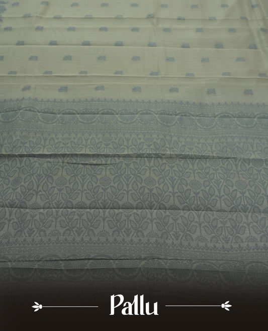 Grey colour silk cotton saree featuring elegant floral zari motifs on the body, complemented by a rich contrast border and pallu with traditional woven detailing & Comes with a matching blouse piece.