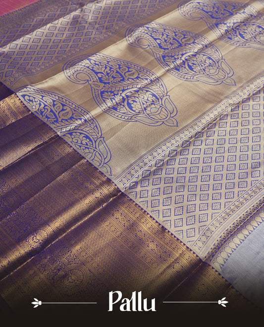 Hot pink colour and Antique gold Zari Tissue Brocade Saree features intricate check and bird Motifs on body and a trypan blue colour traditional border & pallu with floral patterns, paired with matching blouse