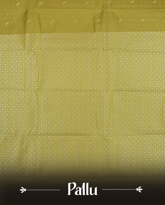 Khaki green colour semi soft silk saree featuring a self coloured textured patterned body, complemented by self coloured plain pallu & border and a matching blouse piece.