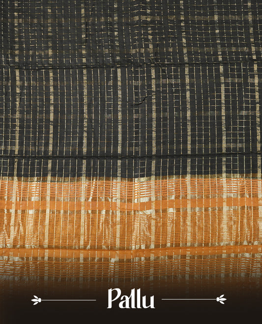 black colour mixed chanderi cotton saree with golden checkered body, mustard orange pallu with golden zari border, matching blouse.