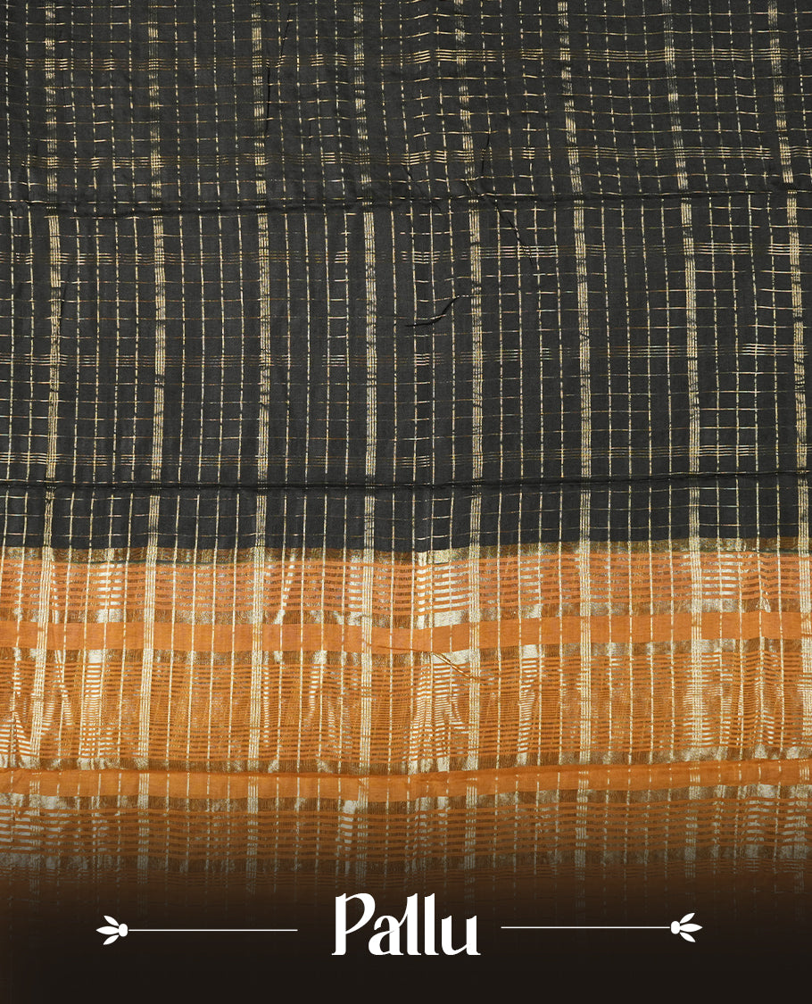 black colour mixed chanderi cotton saree with golden checkered body, mustard orange pallu with golden zari border, matching blouse.
