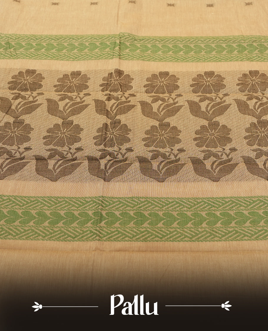 Beige Sand colour Silk Cotton Saree with Pastel Green Floral-Jacquard Pallu Panels and Chevron Bands, Body dotted with tiny thread buttas, Antique Gold Ikat-inspired border over Deep Olive lower edge, and a Plain Beige Sand Blouse with Matching