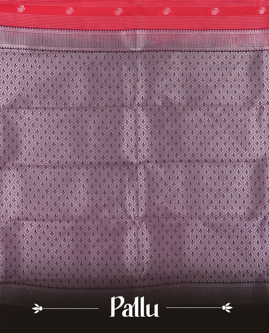 Red colour Semi Silk Saree with rose gold zari patterns on the body, paired with a contrasting Dark violet colour traditional pallu and border, and a matching blouse piece.