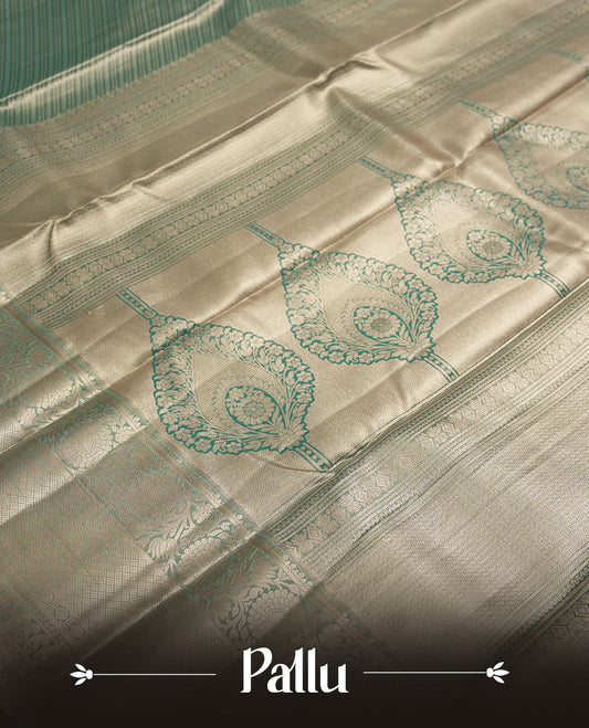 Green colour and Antique gold Zari Tissue Brocade Saree features intricate line Motifs on body and traditional border & pallu , paired with matching blouse