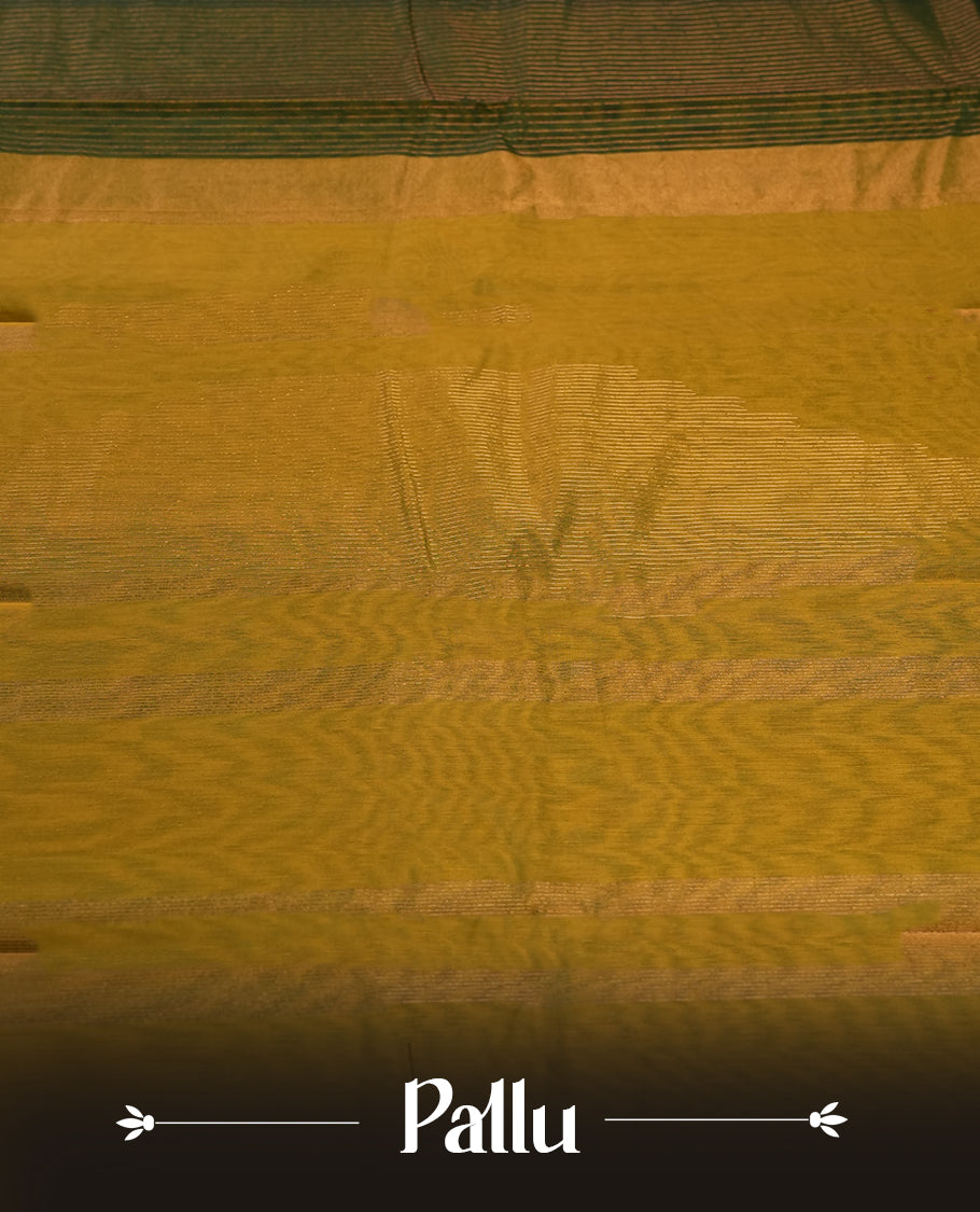 Dark green colour silk cotton saree featuring with full of delicate vertical copper zari lines on the body & green contrasted colour pallu, Crafted without a border for a classy touch, Comes with a matching blouse for a perfectly coordinated look.